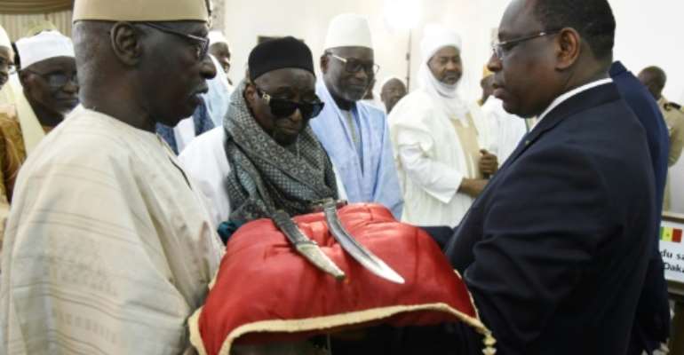 A sword and scabbard said to have belonged to Omar Saidou Tall, an important 19th-century military and religious figure in West Africa, are officially held by the Army Museum in Paris but are on long-term loan to Dakar. By SEYLLOU (AFP/File)