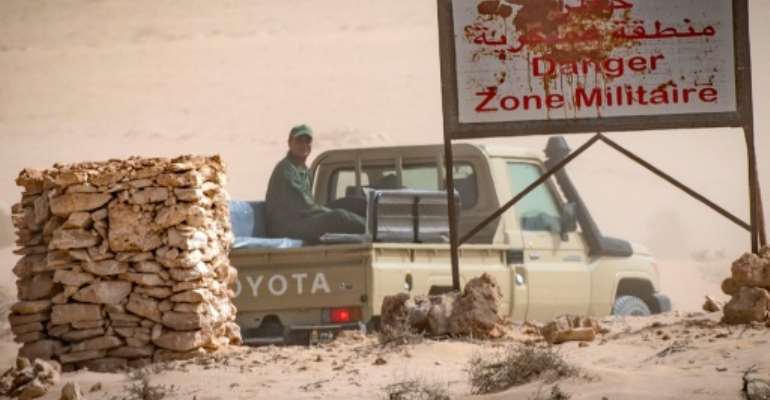 A vehicle of the royal Moroccan armed forces is seen on the Moroccan side of a border crossing point between Morocco and Mauritania in Guerguerat in the far south of Western Sahara, on November 25. By Fadel SENNA (AFP/File)