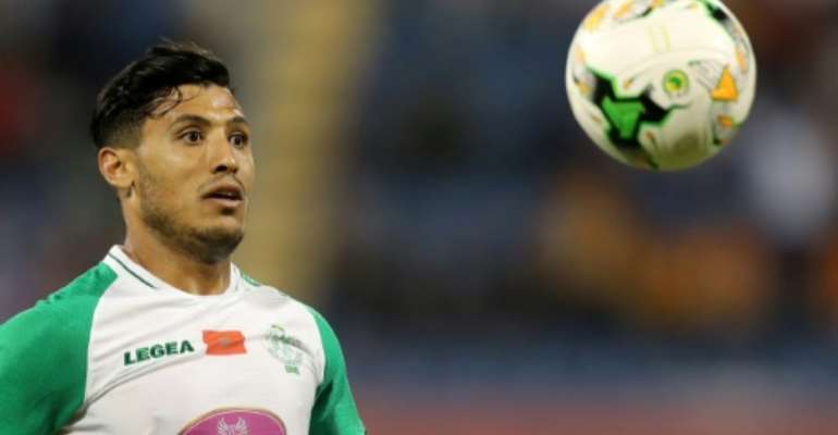 Abdelilah Hafidi put Raja Casablanca ahead in a victory at Olympique Khouribga that moved his club closer to the Moroccan title.. By KARIM JAAFAR (AFP)