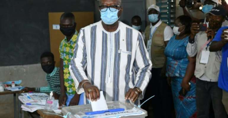 Ahead: President Roch Marc Christian Kabore, seen casting his vote in the capital Ouagadougou on Sunday. By Issouf SANOGO (AFP)