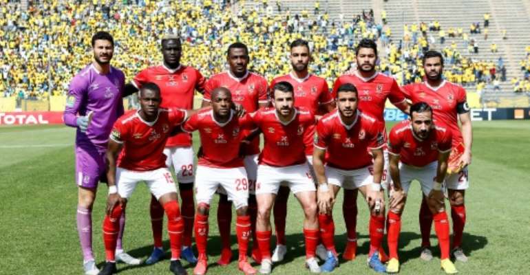 Al Ahly pose before drawing with Mamelodi Sundowns in a 2020 CAF Champions League quarter-final in South Africa. By Phill Magakoe (AFP/File)