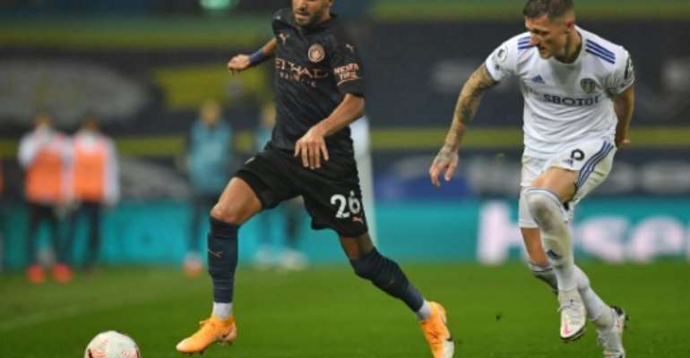 Algeria captain Riyad Mahrez (L) playing for Manchester City against Leeds United in the English Premier League at the weekend.. By Paul ELLIS (POOL/AFP)