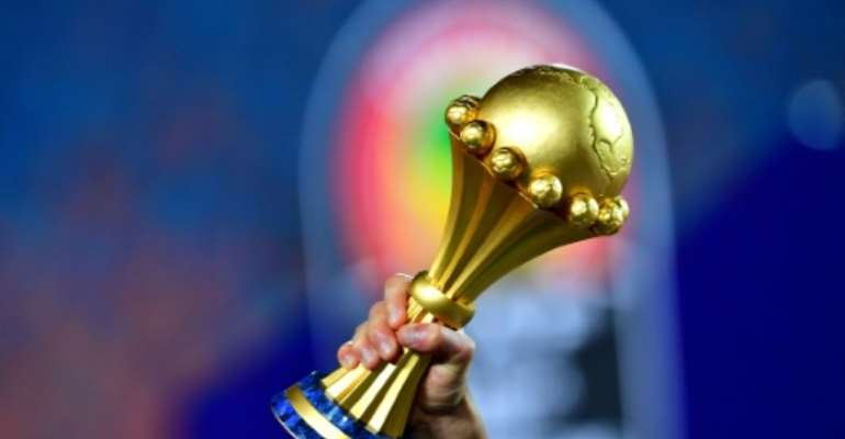 Algerian players celebrate with the trophy after winning the 2019 Africa Cup of Nations (CAN) final against Senegal. By Giuseppe CACACE (AFP)