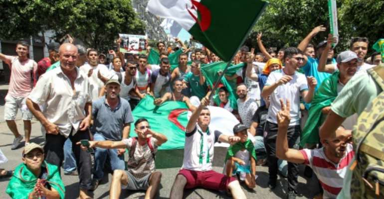 Algerians mix protest and football with eyes on Africa cup