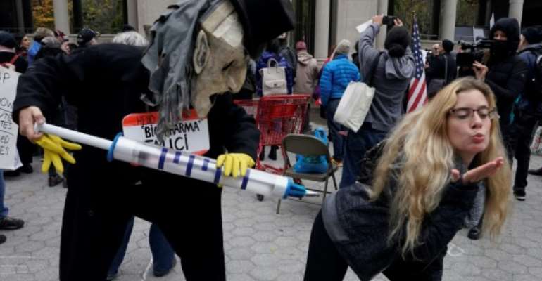 Anti-lockdown protesters in New York, where officials warned a surge in coronavirus cases may lead to new restrictions being imposed. By TIMOTHY A. CLARY (AFP)