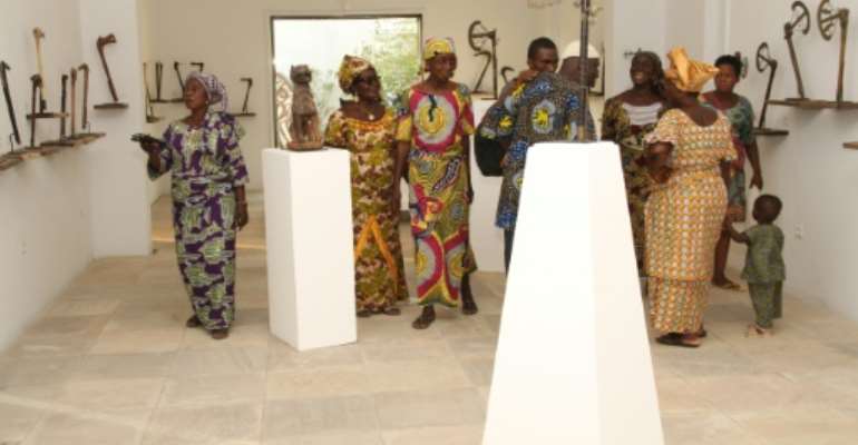Artefacts looted from Benin by Europeans in the 19th century are slowly returning to the west African nation. By Prosper Dagnitche (AFP)