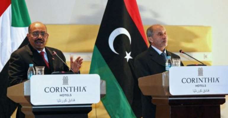 Bashir's arrival in Tripoli marked his first Libya visit since Kadhafi was ousted. By Mahmud Turkia (AFP)