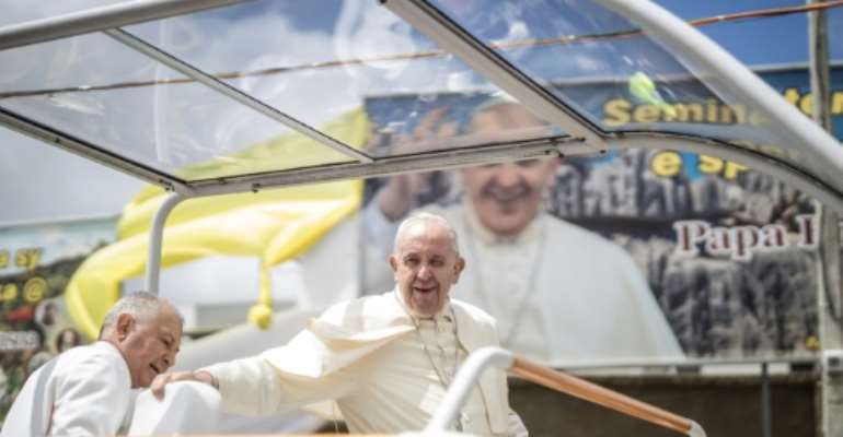 Before Mauritius, Pope Francis held a huge mass in Madagascar's capital and visited Mozambique as part of his three-nation tour. By MARCO LONGARI (AFP)
