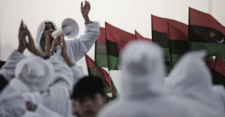 Libyan youth celebrate in the eastern city of Benghazi. By Gianluigi Guercia (AFP)