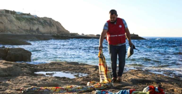 Blankets, including those for a baby, lay on the rocks near where the bodies were found, an AFP correspondent said. By - (AFP)