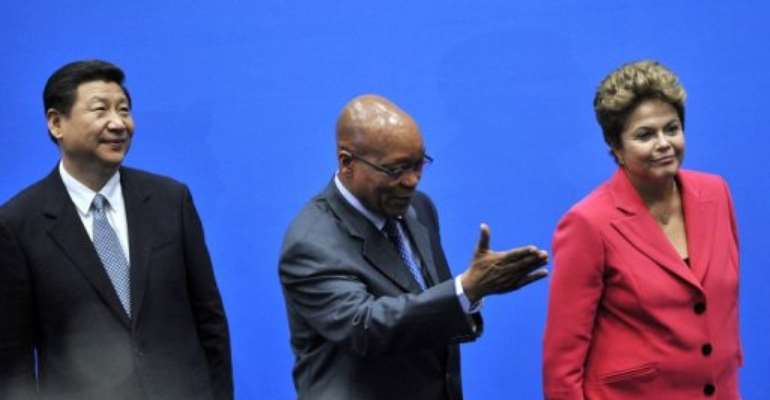 BRICS leaders, including South Africa's President Jacob Zuma, arrive in Durban on March 27, 2013. By Alexander Joe (AFP/File)