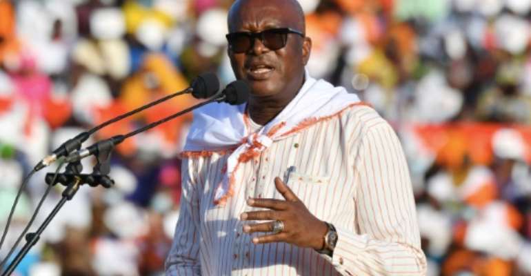 Burkina Faso President Roch Marc Christian Kabore speaks to supporters in his final campaign rally ahead of Sunday's election. By Issouf SANOGO (AFP)