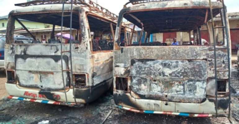 Burned-out buses in Buea, the capital of Cameroon's Southwest Region. The two-year conflict between anglophone separatists and security forces has claimed more than 3,000 lives. By - (AFP)
