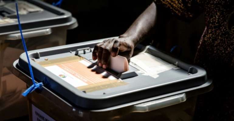 Casting a vote: The elections are the first since the end of Robert Mugabe's 37-year rule. By Luis TATO (AFP)