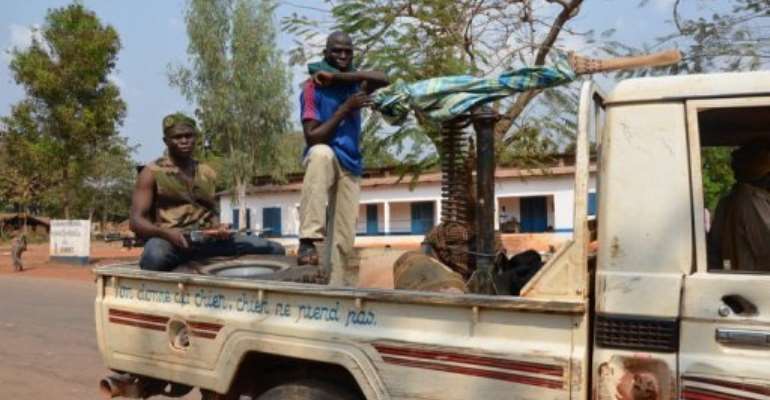 Seleka rebels on January 17, 2013 in a pickup truck, 75 kms from the capital Bangui, Central African Republic. By Patrick Fort (AFP/File)