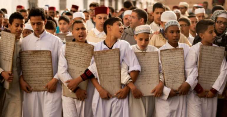 Children head to the Great Mosque of Sale near the Moroccan capital to pray for rain. By FADEL SENNA (AFP)