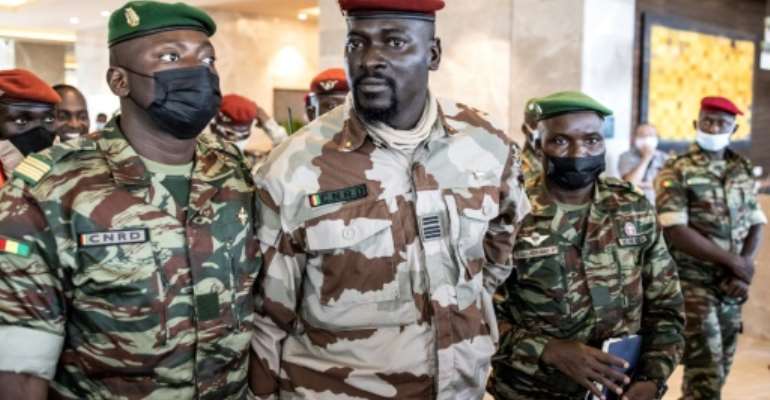 Guinea junta resists poll pressure, rules out exile for ex-president Guinea junta resists poll pressure, rules out exile for ex-president