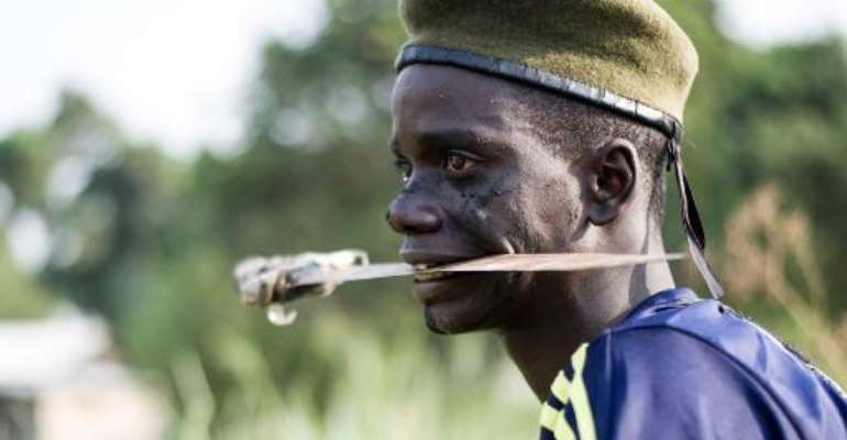 A file photo taken on February 24, 2014 shows a member of the mainly Christian