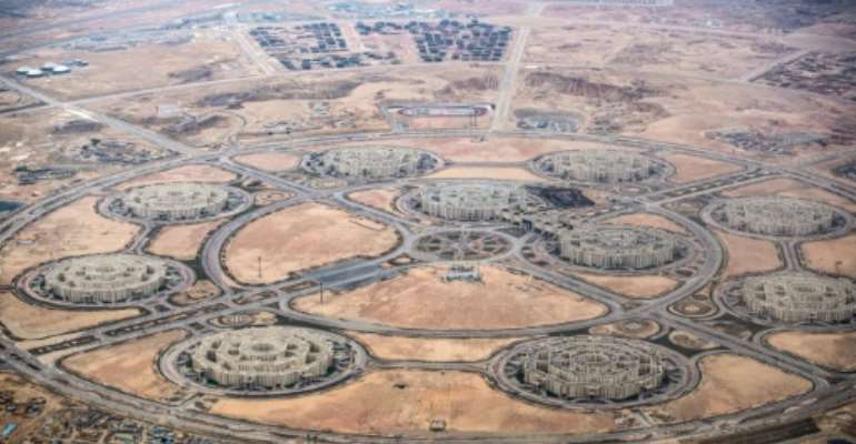 Critics questions how much of the GDP growth in Egypt is driven by ostentatious mega-projectssuch as a new administrative capital being built in the desert. By Khaled DESOUKI (AFP/File)