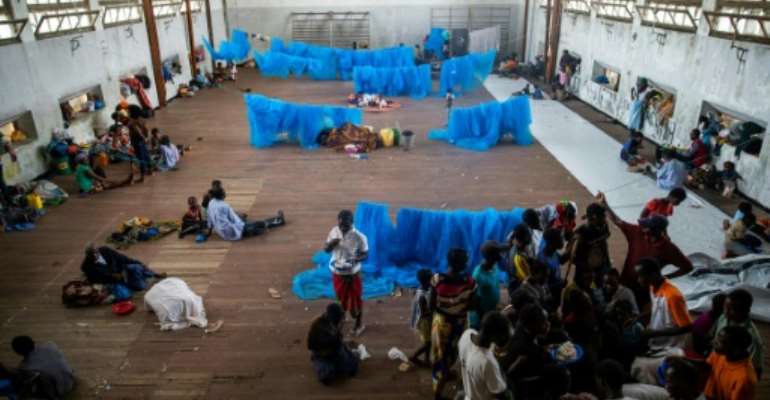 Cyclone survivors shelter in a school in Beira, Mozambique. By WIKUS DE WET (AFP)