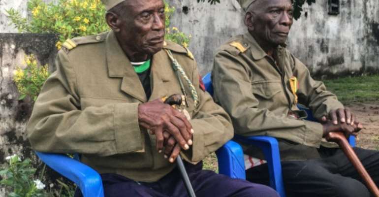 Daniel Miuki (R) and Albert Kunyuku Ngoma (L) are the last survivors of the Public Force, the Belgian colonial army.  By Manu Kalombo (AFP)