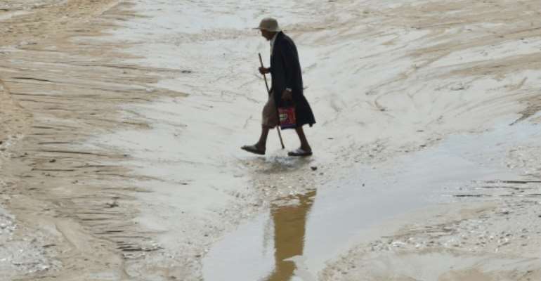 Deadly flash flooding in central Tunisia, similar to the flood pictured in September 2018, comes less than a month after torrential rains killed at leaset five people in the northwest of the country. By FETHI BELAID (AFP/File)