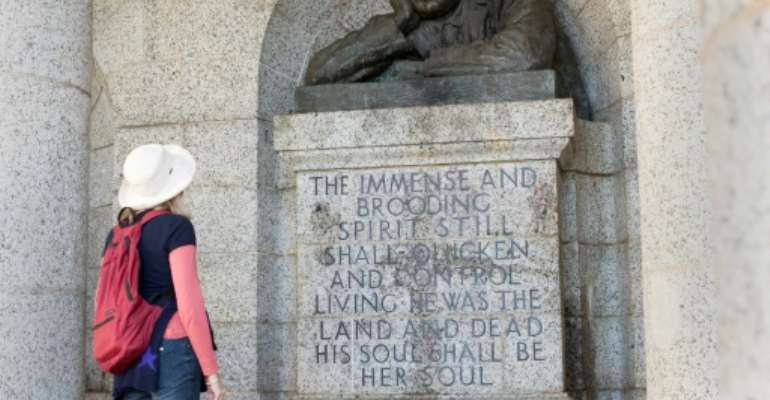 Decapitated: The Rhodes bust had already been targeted twice before. By RODGER BOSCH (AFP)