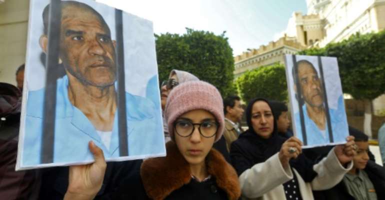 Dozens of Senussi's relatives protested Saturday in Libya's capital Tripoli. By Mahmud Turkia (AFP)