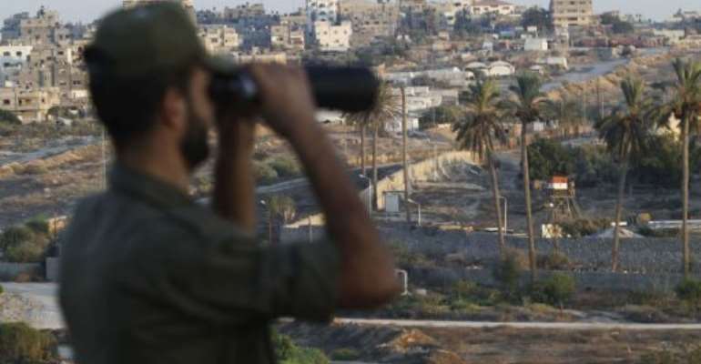 A Palestinian Hamas security guard on duty at the border between Egypt and Gaza Strip, in Rafah on September 11, 2013. By Said Khatib (AFP/FIle)