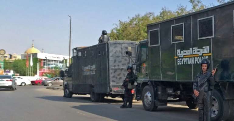 Egyptian riot police stand guard in Cairo to prevent any protests, amid an intensifying crackdown against dissent. By Khaled DESOUKI (AFP)