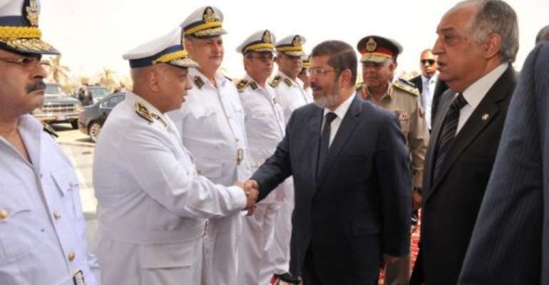 Morsi still has to contend with the Supreme Council of the Armed Forces. By (AFP/Egyptian Presidency)