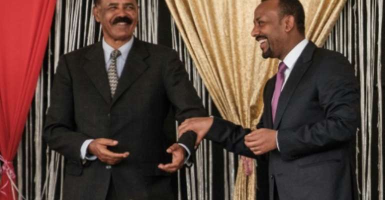 Eritrea's President Isaias Afwerki (L) and Ethiopia's Prime Minister Abiy Ahmed first met last year. By EDUARDO SOTERAS (AFP/File)