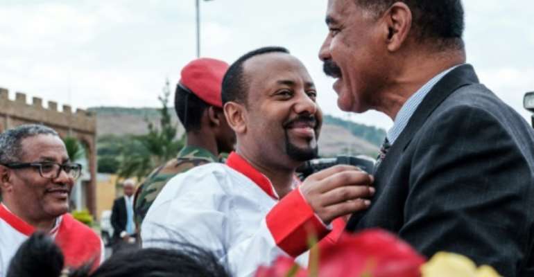 Ethiopian Prime Minister Abiy Ahmed (C) and Eritrea's President Isaias Afwerki embarked on a whip-fast rapprochement last year. By EDUARDO SOTERAS (AFP/File)