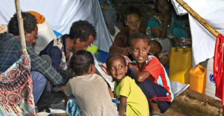 Ethiopian refugees have fled fighting in Tigray province into Sudan. By ASHRAF SHAZLY (AFP)