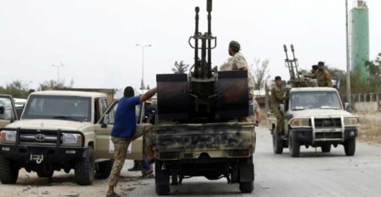 Fighters loyal to Libya's internationally-recognised Government of National Accord (GNA) display US-made Javelin anti-tank missiles and munitions reportedly seized from forces loyal to military strongman Khalifa Haftar. By - (AFP)