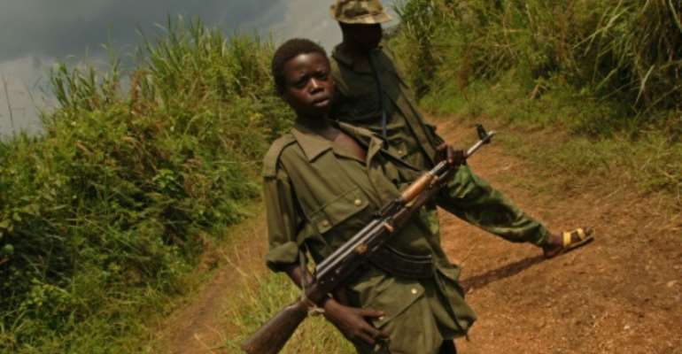 Fighters of the Front for Patriotic Resistance in Ituri (FRPI), which signed a peace deal with the government in February. By LIONEL HEALING (AFP/File)