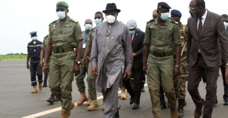 Former Nigerian president Goodluck Jonathan is leading the ECOWAS delegation to Mali following Tuesday's coup. By ANNIE RISEMBERG (AFP)