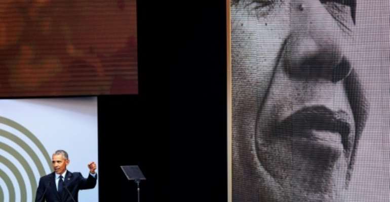 Former US President Barack Obama spoke during the 2018 Nelson Mandela Annual Lecture at the Wanderers cricket stadium in Johannesburg on July 17. By MARCO LONGARI (AFP/File)