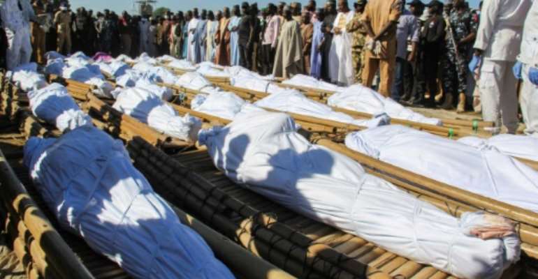 Forty-three of the victims were buried Sunday. By Audu Marte (AFP)
