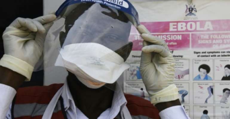 Four people were diagnosed with the virus in Uganda and later died. By ISAAC KASAMANI (AFP/File)