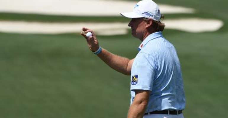 Ernie Els of South Africa greets fans on the 10th hole during Round 1 of the 79th Masters Golf Tournament at Augusta National Golf Club on April 9, 2015, in Augusta, Georgia. By Don Emmert (AFP)