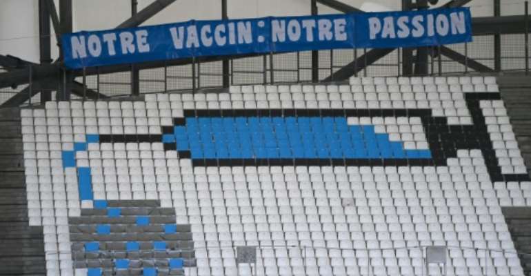 France, which saw its death toll rise past 70,000 at the weekend, is set to begin inoculating people over 75 from Monday. By Christophe SIMON (AFP/File)