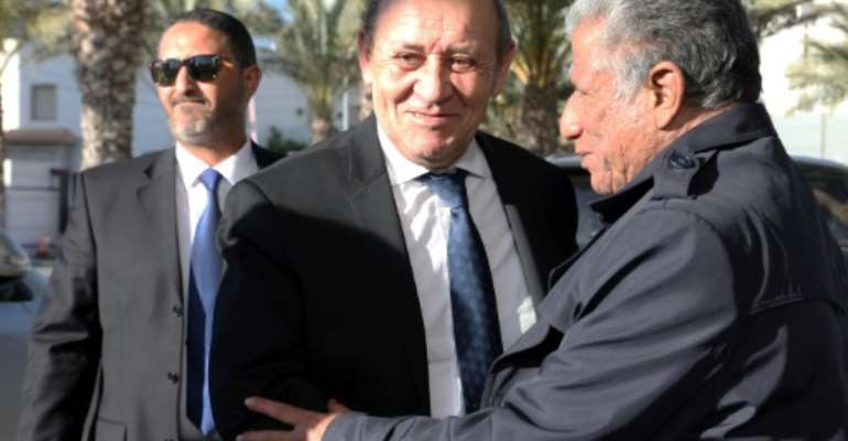 France's Foreign Minister Jean-Yves Le Drian in the Libyan capital Tripoli on March 18, 2019. By str (AFP)