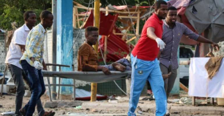 Friday's attack was the latest in a wave of bombings by Al-Shabaab, an Al-Qaeda affiliate which has been fighting to overthrow the internationally-backed Somali government for over a decade. By ABDIRAZAK HUSSEIN FARAH (AFP)