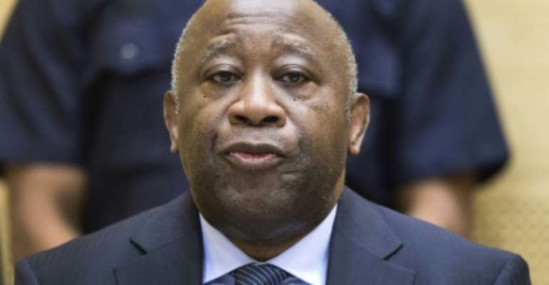 Gbagbo, seen here at a pre-trial hearing on charges of crimes against humanity at the International Criminal Court in The Hague in February 2013. By MICHAEL KOOREN (POOL/AFP/File)