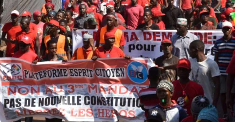 Guinea's 82-year-old Alpha Conde drew masses of people into the streets in rolling protests against his controversial -- and eventually successful -- bid for a third term. By CELLOU BINANI (AFP/File)