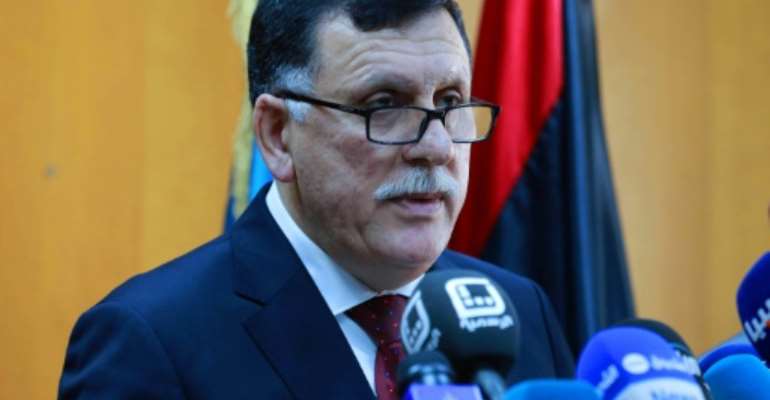 Libya's UN-backed Prime Minister-designate, Fayez al-Sarraj speaks on March 30, 2016 in the capital Tripoli. By (AFP)