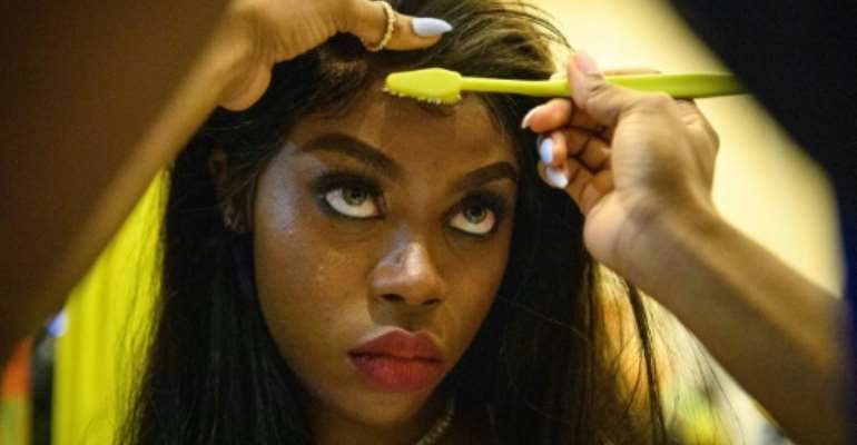 Harmony Anne-Marie Ilunga opened a small agency in Hong Kong to champion models of all skin tones and sizes. By Anthony WALLACE (AFP)