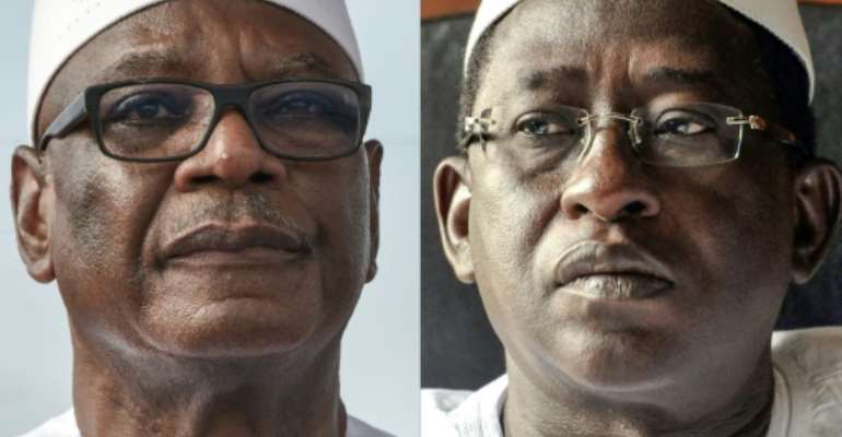 Head to head: Ibrahim Boubacar Keita, left, faces off against opposition leader Soumaila Cisse on Sunday. By Sia KAMBOU, Issouf SANOGO (AFP/File)