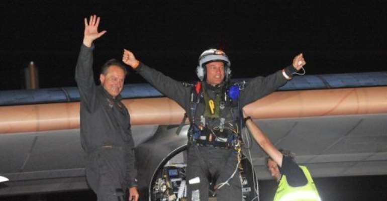 Bertrand Piccard (right) and co-pilot Andre Borschberg after landing the Solar Impulse at Rabat Sale airport. By Abdelhak Senna (AFP)